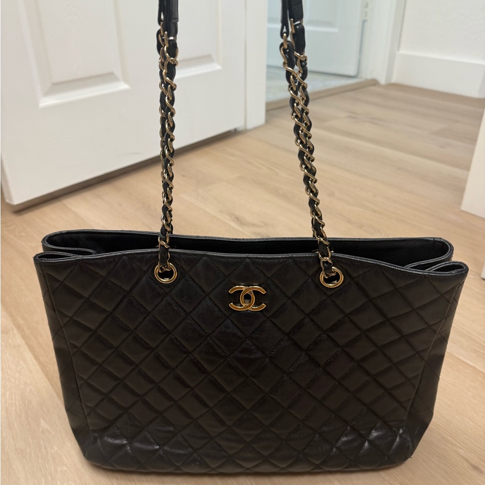 CHANEL Black Quilted Tote with Gold Accents